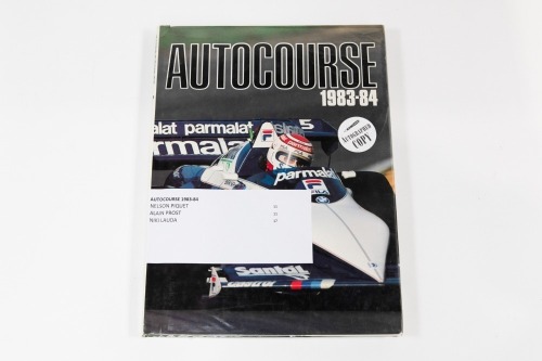 AUTOCOURSE: A signed copy of 'Autocourse' edition 1983-84, signed by Nelson Piquet, Alain Prost & Niki Lauda [Location: Melbourne]