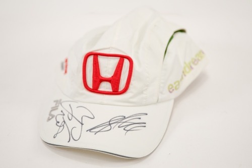 HONDA: A Honda hat signed by drivers Jenson Button & Alex Wurz [Location: Melbourne]