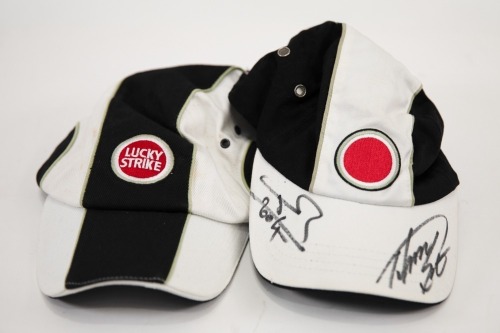 LUCKY STRIKE: Two Lucky Strike hats, one signed by Jenson Button & Takuma Sato [Location: Melbourne]