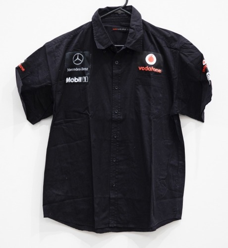 MCLAREN / MERCEDES: A group of four Mclaren / Mercedes mens button shirts [Location: Melbourne]