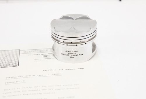 ALAN JONES: A commemorative piston released by Cosworth Engineering used by Alan Jones in his Williams FW 07/09 at the 1980 USA East Grand Prix [Location: Melbourne]
