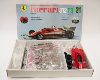 FERRARI: A Protar 1:12 scale Ferrari 312 T3 model kit, some parts sealed, has been started, includes instructions & decals [Location: Melbourne]