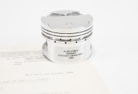 ALAN JONES: A commemorative piston released by Cosworth Engineering used by Alan Jones in his Williams FW 07/09 at the 1980 USA East Grand Prix [Location: Melbourne]