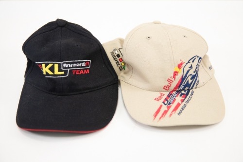 HATS: Two hats, includes one Red Bull US Grand Prix hat and one Minardi F1 team hat [Location: Melbourne]