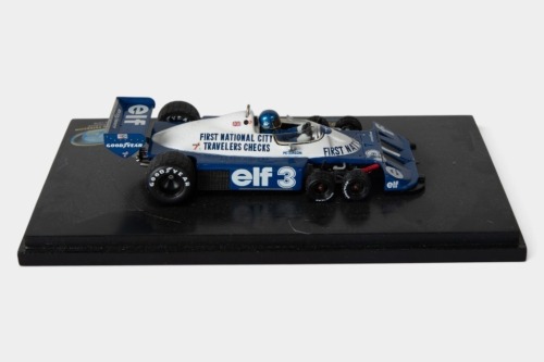 TYRRELL: A TrueScale Miniatures (TSM) 1:43 scale 1977 Tyrrell P34 car #3 US Grand Prix as driven by Ronnie Peterson in perspex case [Location: Melbourne]