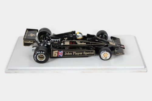 LOTUS: A 1:43 scale 1977 Lotus 78 car #6 as driven by Gunnar Nilsson in perspex case, manufacturer unknown [Location: Melbourne]