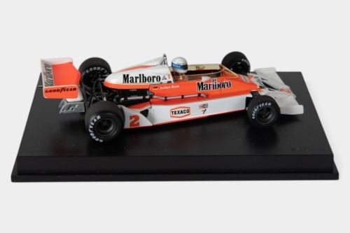 MCLAREN: A Minichamps 1:43 scale 1977 McLaren Ford M26 car #2 in perspex case [Location: Melbourne]