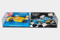 F1 MODELS: Two Minichamps 1:43 scale Indy / F1 models in original perspex cases [Location: Melbourne]