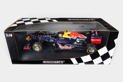 RED BULL: A Minichamps 1:18 scale 2011 Red Bull Racing Renault RB7 as driven by Mark Webber in original box [Location: Melbourne]