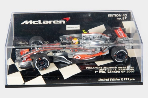 MCLAREN: A Minichamps 1:43 scale 2007 Vodafone McLaren Mercedes MP4/22 car #2 as driven by Lewis Hamilton in original box [Location: Melbourne]