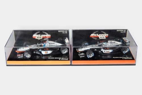MCLAREN: Two Minichamps 1:43 scale McLaren team models in original boxes [Location: Melbourne]