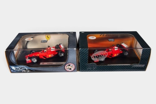 FERRARI: Two Hot Wheels Racing 1:43 scale Ferrari team models in original boxes [Location: Melbourne]