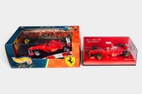 FERRARI: Two Ferrari team 1:43 scale models on original boxes [Location: Melbourne]