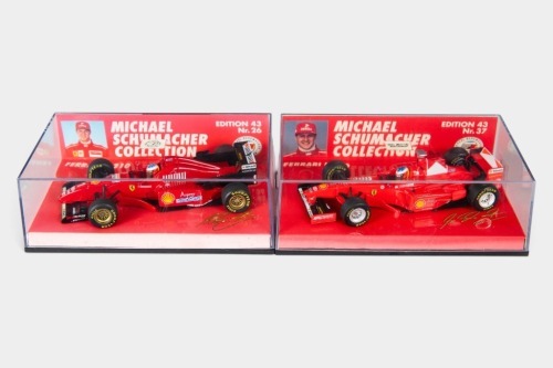 FERRARI: Two Minichamps 1:43 scale Ferrari team models in original boxes [Location: Melbourne]