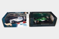 STEWART / JAGUAR: Two Hot Wheels Racing 1:43 scale Stewart & Jaguar team models in original boxes [Location: Melbourne]
