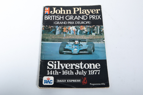 BRITISH GP: An official signed programme from the 1977 British Grand Prix at Silverstone, signed by Hunt, Lauda, Jones, Villeneuve, Andretti, Scheckter, Reutmann & Nilsson [Location: Melbourne]