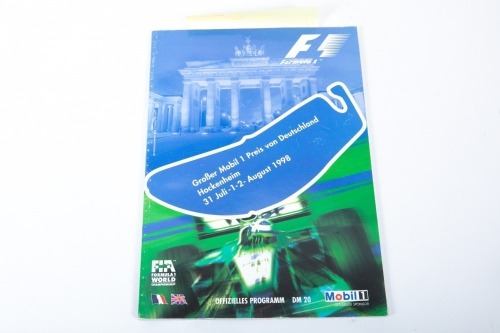 GERMAN GP: A signed official programme for the 1998 German Grand Prix at Hockenheim, signed by an ensemble number of drivers [Location: Melbourne]