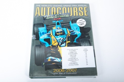 AUTOCOURSE: A signed copy of 'Autocourse' edition 2006/07, signed by Alonso, Hamilton, Raikkonen, Button, Massa, Fisichella, Barrichello, Trulli, Rosberg & Coulthard [Location: Melbourne]