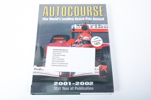 AUTOCOURSE: A signed copy of 'Autocourse' edition 2001/02, signed by Schumacher, Irvine, Alonso, Alesi, Hakkinen, Raikkonen, R.Schumacher & Barichello [Location: Melbourne]