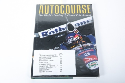 AUTOCOURSE: A signed copy of 'Autocourse' edition 1997/98, signed by Villeneuve, Schumacher, Hakkinen, Coulthard, Alesi, Frentzen, Fisichella, Barichello, Irvine & Herbert [Location: Melbourne]