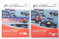 INDIAN GP: Two signed official programmes from the 2011 Indian Grand Prix [Location: Melbourne] - 2