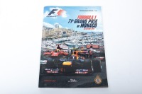 MONACO GP: An official signed programme from the 2013 Monaco GP, signed by numerous drivers [Location: Melbourne]