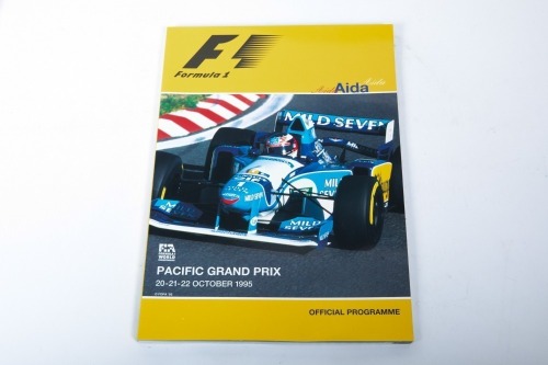 PACIFIC GP: An official signed programme from the 1995 Pacific Grand Prix held in Aida, Japan, signed by Schumacher, Hill, Coulthard, Alesi, Berger & Barrichello [Location: Melbourne]