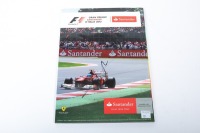 ITALIAN GP: An official signed programme from the 2012 Italian Grand Prix at Monza, signed by numerous drivers [Location: Melbourne] - 2