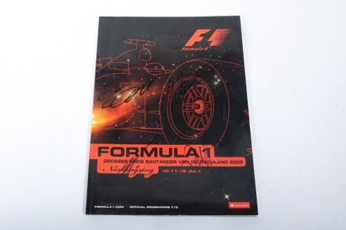 GERMAN GP: An official signed programme from the 2009 German Grand Prix at Nurburgring, signed on cover by Alonso, Webber, Massa, Vettel & Raikkonen [Location: Melbourne]