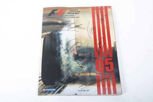 AUSTRALIAN GP: An official programme from the 2005 Australian Grand Prix at Albert Park, signed on cover by Schumacher, Villeneuve, Alonso, Webber & others [Location: Melbourne]