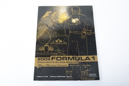 ABU DHABI GP: An official signed programme from the 2009 Abu Dhabi GP, signed by many drivers such as Hill, Hamilton, Fisichella, Alonso & many more [Location: Melbourne]
