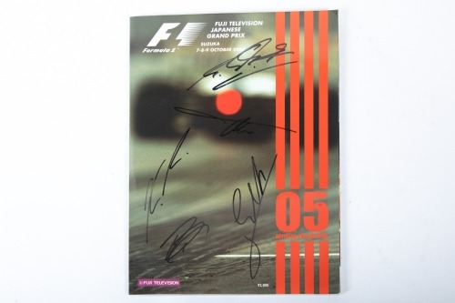 JAPANESE GP: An official programme from the 2005 Japanese Grand Prix at Suzuka, signed by Schumacher, Raikkonen, Alonso, Barrichello & Trulli [Location: Melbourne]