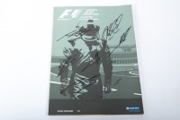 BRITISH GP: An official programme from the 2003 British GP at Silverstone, signed on cover by Schumacher, Button, Trulli, Raikkonen, Alonso, Coulthard, Panis & Barichello [Location: Melbourne]