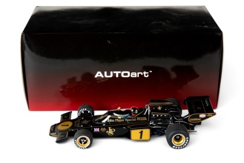 LOTUS: A highly detailed Autoart 1:18 scale 1973 Team Lotus Type 72E, car #1 driver Emerson Fittipaldi in Original box [Location: Melbourne]