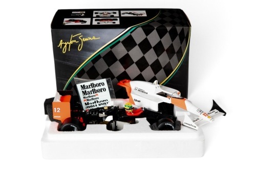 MCLAREN: A PremiumX 1:18 scale 1988 McLaren MP4/4, car #12 driver Ayrton Senna, with removable body in original box [Location: Melbourne]
