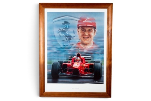 SCHUMACHER: A print featuring a portrait of Michael Schumacher above Ferrari F1 car, 71cm high, 55cm wide [Location: Melbourne]