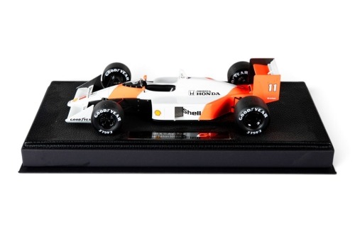 MCLAREN: A highly detailed GP Replicas 1:18 scale 1990 McLaren MP4/4, car #11 driver Alain Prost, limited edition of 999 units in original box [Location: Melbourne]