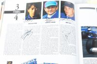 AUTOCOURSE: A signed copy of 'Autocourse' edition 1995-96, signed by Hakkinen, Irvine, Herbert, Katayama, Salo, Magnussen, Montermini, Lamy, Brundle & Panis [Location: Melbourne] - 6