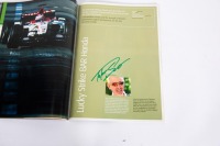 EUROPEAN GP: An official signed programme from the 2003 European Grand Prix held at Nurburgring, signed by an ensemble number of drivers, most notably Schumacher, Coulthard, Raikkonen, Alonso & Webber [Location: Melbourne] - 22