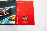EUROPEAN GP: An official signed programme from the 2003 European Grand Prix held at Nurburgring, signed by an ensemble number of drivers, most notably Schumacher, Coulthard, Raikkonen, Alonso & Webber [Location: Melbourne] - 27