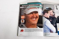 BRITISH GP: An official signed programme from the 2011 British GP at Silverstone, signed by many drivers such as Schumacher, Hamilton, Alonso, Button & more [Location: Melbourne] - 14