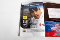 BRITISH GP: An official signed programme from the 2011 British GP at Silverstone, signed by many drivers such as Schumacher, Hamilton, Alonso, Button & more [Location: Melbourne] - 21