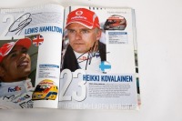 BRITISH: An official signed programme from the 2008 British GP, signed by many drivers such as Hill, Raikkonen, Rosberg, Piquet Jnr, Webber & many more [Location: Melbourne] - 21