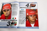 ABU DHABI GP: An official signed programme from the 2009 Abu Dhabi GP, signed by many drivers such as Hill, Hamilton, Fisichella, Alonso & many more [Location: Melbourne] - 8