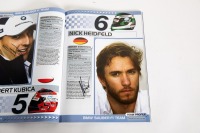 ABU DHABI GP: An official signed programme from the 2009 Abu Dhabi GP, signed by many drivers such as Hill, Hamilton, Fisichella, Alonso & many more [Location: Melbourne] - 10