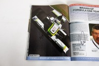 ABU DHABI GP: An official signed programme from the 2009 Abu Dhabi GP, signed by many drivers such as Hill, Hamilton, Fisichella, Alonso & many more [Location: Melbourne] - 22