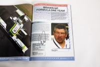 ABU DHABI GP: An official signed programme from the 2009 Abu Dhabi GP, signed by many drivers such as Hill, Hamilton, Fisichella, Alonso & many more [Location: Melbourne] - 23