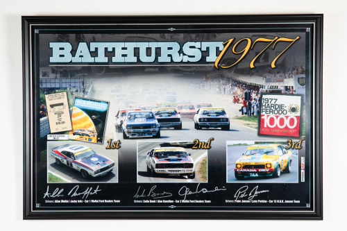 BATHURST: A signed poster 'Bathurst 1977' featuring top finishing cars & with signatures from Allan Moffat, Colin Bond, Alan Hamilton & Peter Janson, also with entry ticket signed by Moffat, 55cm high, 80cm wide overall