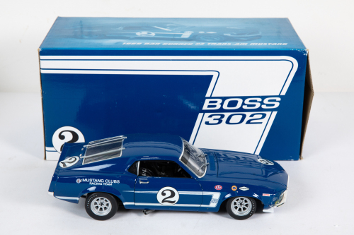 133 · FORD: A Welly 1:18 scale 1969 Ford Trans-Am Mustang, car #2 driver Dan Gurney in original box