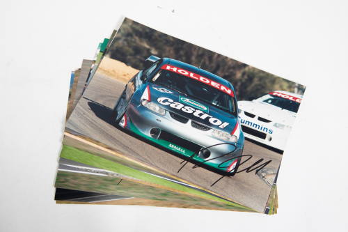 175 · RUSSELL INGALL: A group of nine, all signed, colour photographs of Russell Ingall in various cars, all each individually signed by Ingall, all 20cm high, 30cm wide